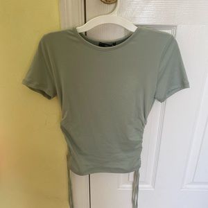 Green adjustable length top with strings by Forever 21 (S)